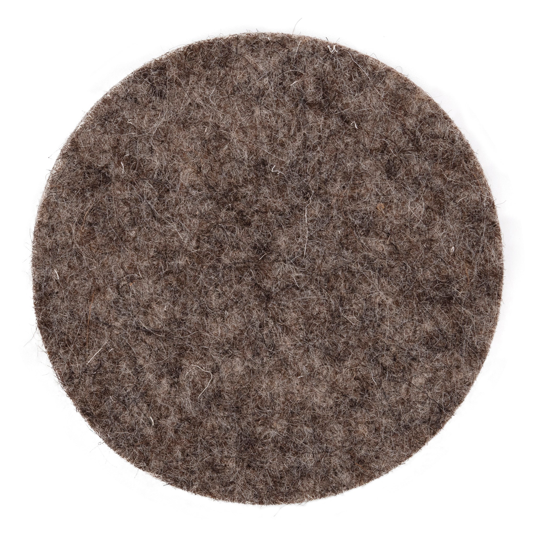circular british sheep's wool luxury felted coaster on a white background