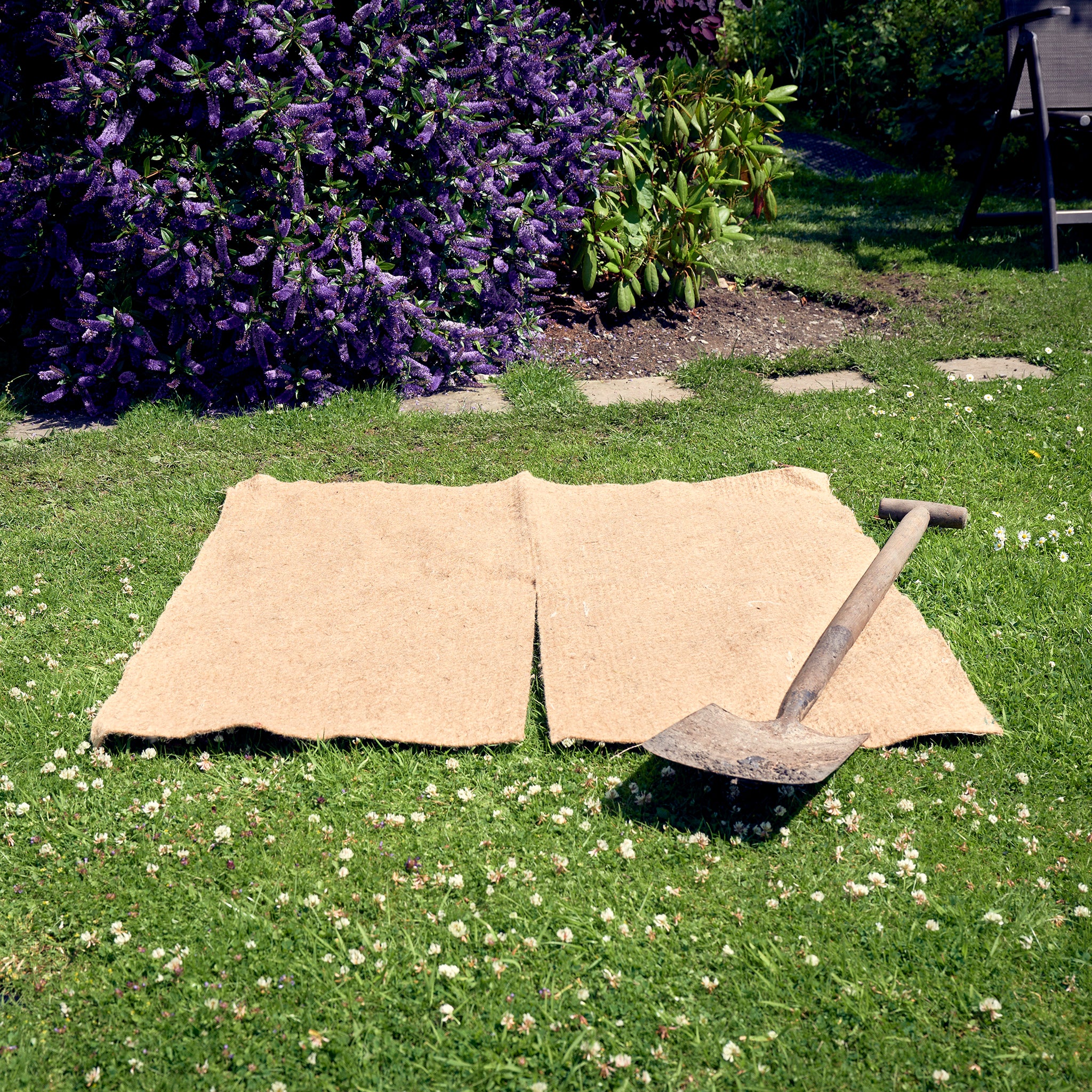square mulch mat in garden