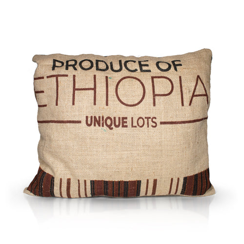 A mix off wool filled, jute hessian outdoor cushion