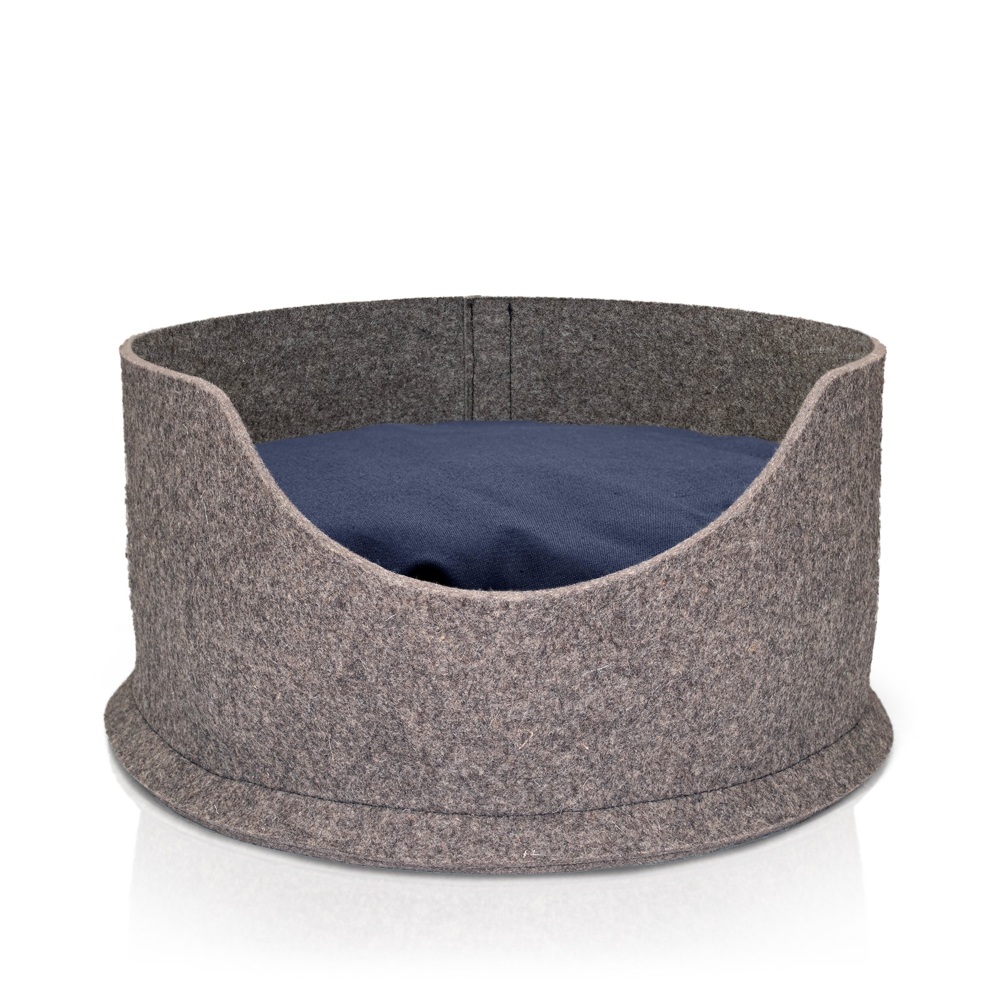 Chimney Sheep felted pet bed in small and large - with a blue cushion inside