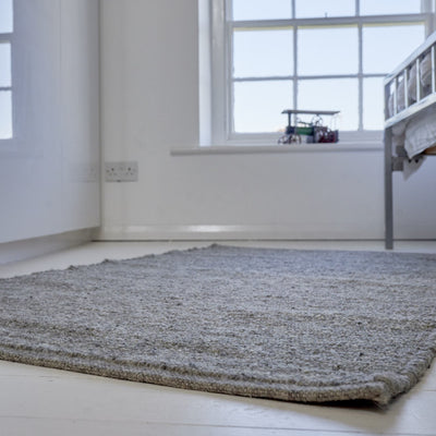 Small wool rug in contemporary bedroom