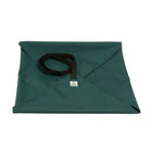 Single green storage wrap for a wool chimney draught excluder.