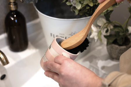 Hillbrush natural dog grooming brush in use — FSC beechwood handle with natural bristles
