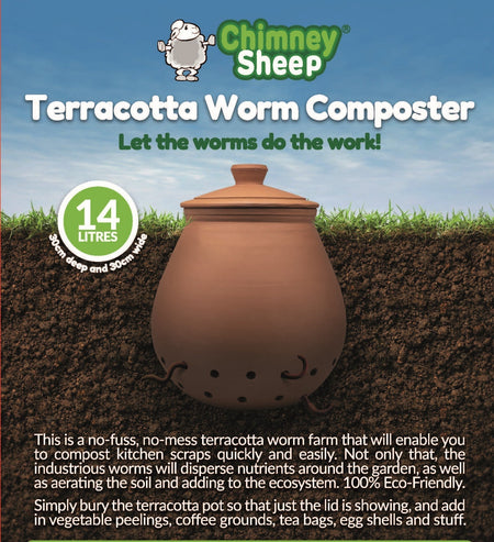 Terracotta in-ground worm composter buried in a garden bed