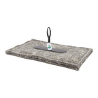 Grey wool chimney draught excluder with short handle and safety tag.