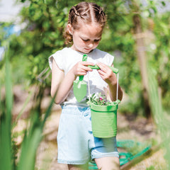 girl with bucket and spade thumbnail