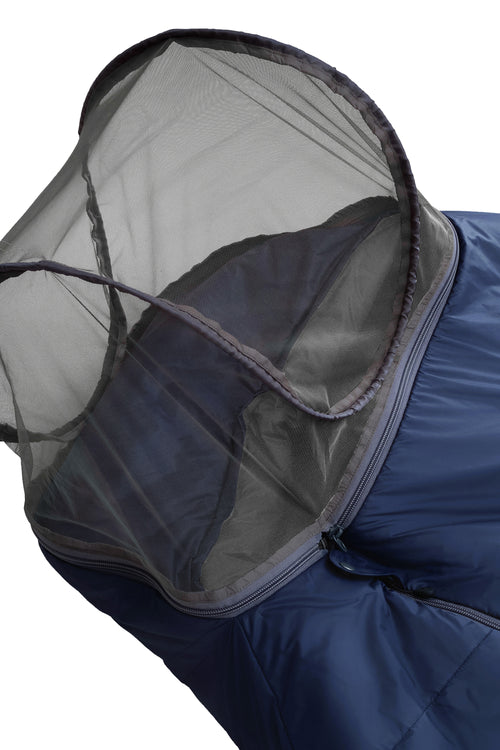 A dark navy blue sleeping bag with a gray interior lining, shown vertically against a plain white background. The sleeping bag features a zippered pocket on the upper side and a small red and white logo near the bottom.