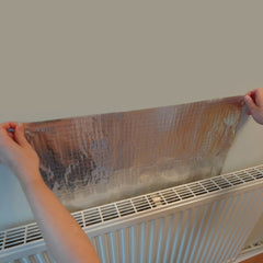Radiator foil being fitted behind a radiator thumbnail