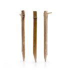 Three  bamboo pegs on a white background