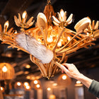 Lambswool duster cleaning a light cleverly made out of Hillbrush natural brushes