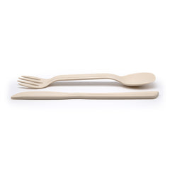 Eco-friendly spork and knife laid out on a white background. thumbnail