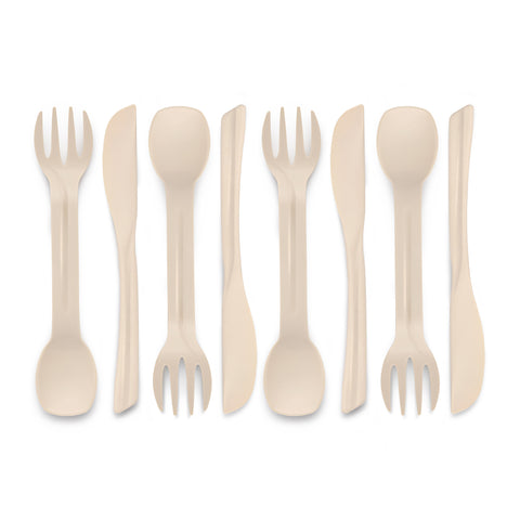 Eco-friendly spork and knife laid out on a white background.