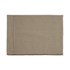 A Chimney Sheep Luxury felted wool dog bed. The bed is large and rectangular. This luxury wool dog bed is placed onto a white background. The organic cotton cover is patterned. The pattern is plain olive colour