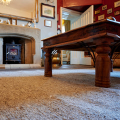 grey wool rug in a living room thumbnail