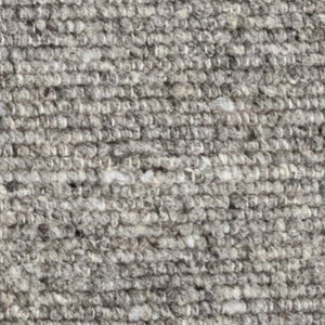 Close-up of the Herdwick and Texel wool rug in shades of grey. 