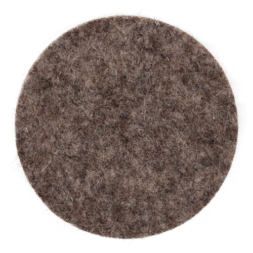 The Lakeland Collection box, displaying four luxury british sheep's wool felted coasters, on a white background