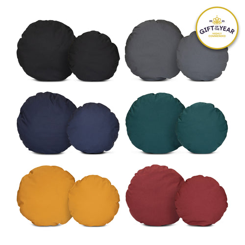 White cat lying in a grey felt pet bed with a 'Gift of the Year Highly Commended' badge.