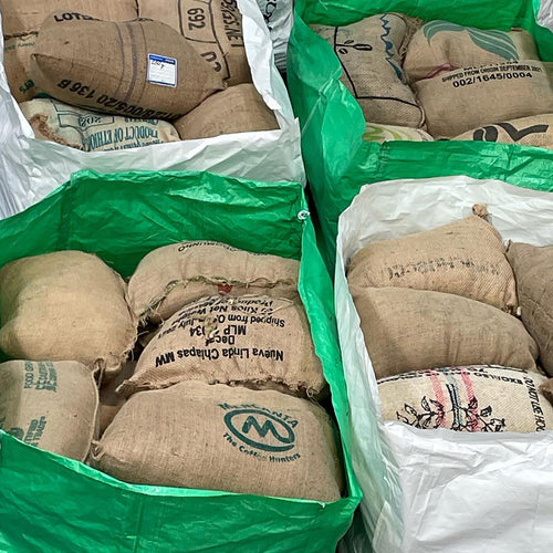 Big Wool Bag empty and open on warehouse floor.