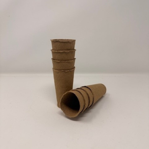 Deep root training pots made of recycled fibre from sustainable forests. Two stacks of 4 on a white background. 