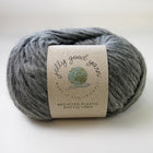 Grey yarn with Jolly Good Yarn label, made of recycled plastic bottles 
