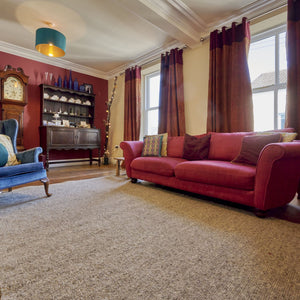 Large wool rug in traditional living room