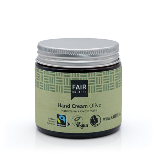 Glass jar with metal screw top lid of Fair Squared Olive Oil Hand Cream