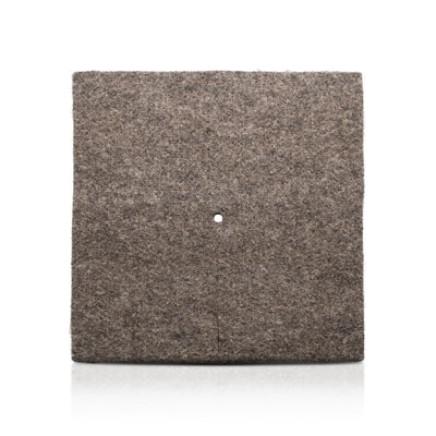 Herdwick Wool Felted Mulch Mat on white background. 