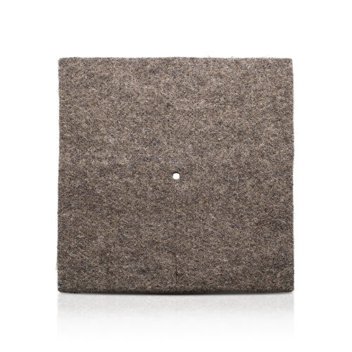 Herdwick Wool Felted Mulch Mat on white background. 