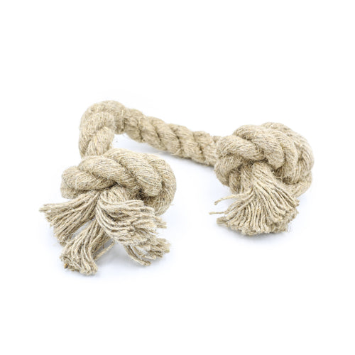 A small natural jute hemp knotted rope toy sits upon a white background. This natural knotted dog toy has two knots and this is the smaller size.