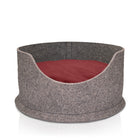Bright red cushion in side an eco friendly cat or dog bed 