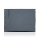 Grey luxury dog bed made of organic fabric filled with sheep wool felt on a white background