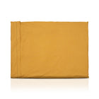 Mustard yellow luxury dog bed made of organic fabric filled with sheep wool felt on a white background