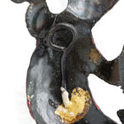 Close up of hanging hook on lizard decoration.
