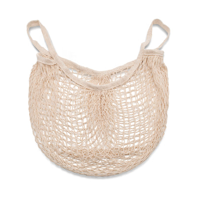 Cream coloured cotton string bag lay down on a white background. 