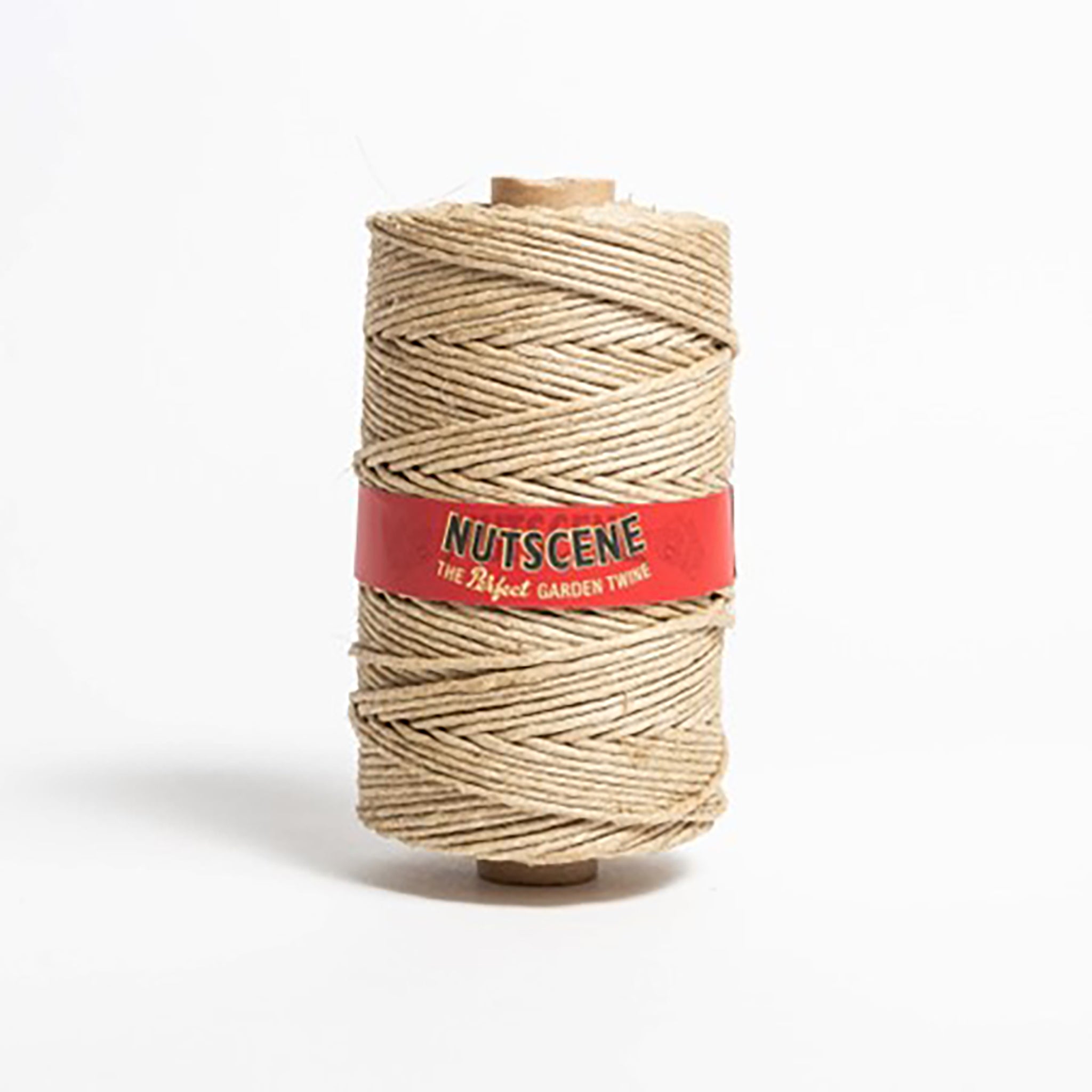 A spool of hairless flax twine, wrapped with a red label
