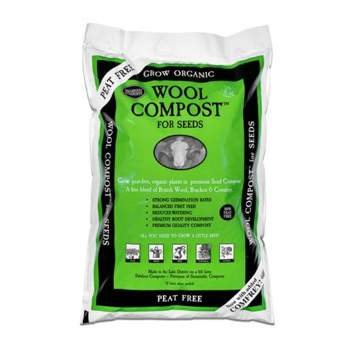 A bag of Dalefoot Peat Free Wool Compost for Seeds, designed for growing organic plants. The bag is white with a large green and black label on the front, featuring a cow illustration and product details.