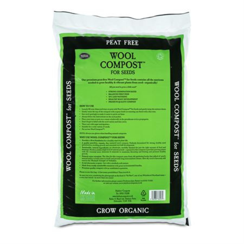 A bag of Dalefoot Peat Free Wool Compost for Seeds, designed for growing organic plants. The bag is white with a large green and black label on the front, featuring a cow illustration and product details.