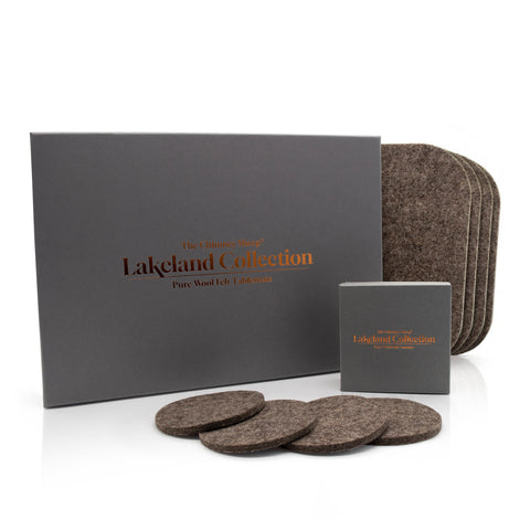 The Lakeland Collection box, displaying four luxury british sheep's wool felted coasters, on a white background