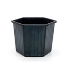 Black rubber plant pot on a white background.