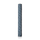 A single rolled piece of textured fabric, in a dusty slate blue colour with a repeating dark blue flower pattern, standing vertically on a white background.