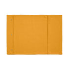 A Chimney Sheep wool filled portable rollup travel dog bed sits on a white background. This flat rectangular portable roll up dog bed is in the colour yellow. You can see the white poppers which allow it to be simply rolled into a tight package for easy transportation.