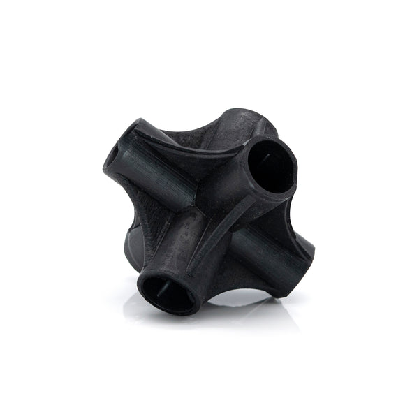 Single natural rubber cane connector close up on a white background. 