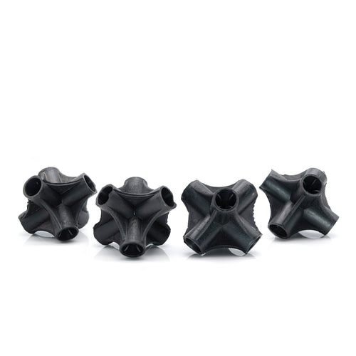 Single natural rubber cane connector close up on a white background. 