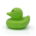 Green rubber duck with black eye on a white background. 