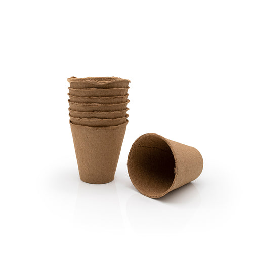 Brown biodegradable fibre seedling pot on a white background