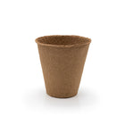 Brown biodegradable fibre seedling pot on a white background