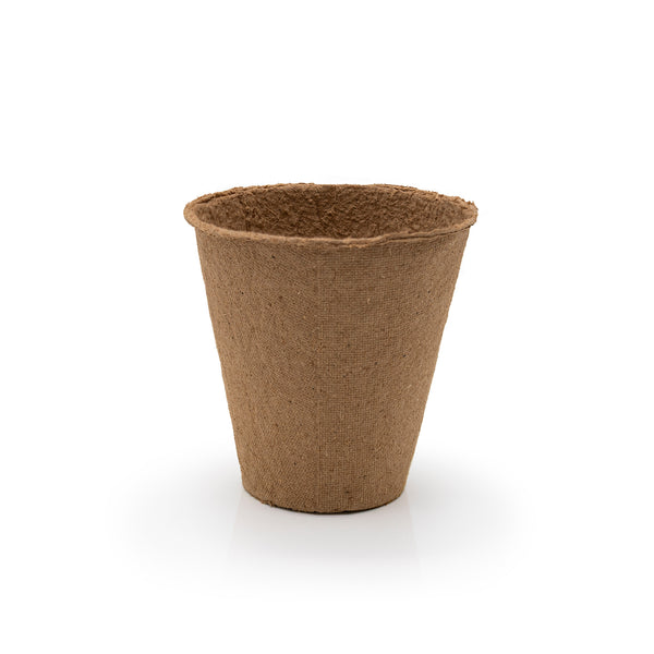 Brown biodegradable fibre seedling pot on a white background