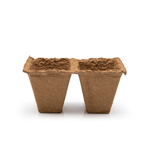 Brown biodegradable fibre seedling pot on a white background