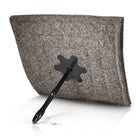 Wool chimney blocker with extension rod and handle attached.