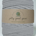 Chunky t-shirt yarn in stormy grey and with a light background